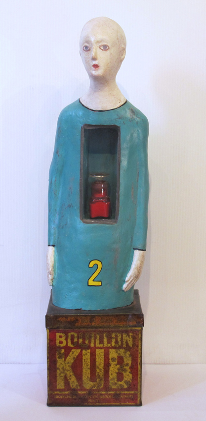 Personnage sur boîte bouillon kub